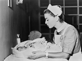 Nurse looking after crying baby